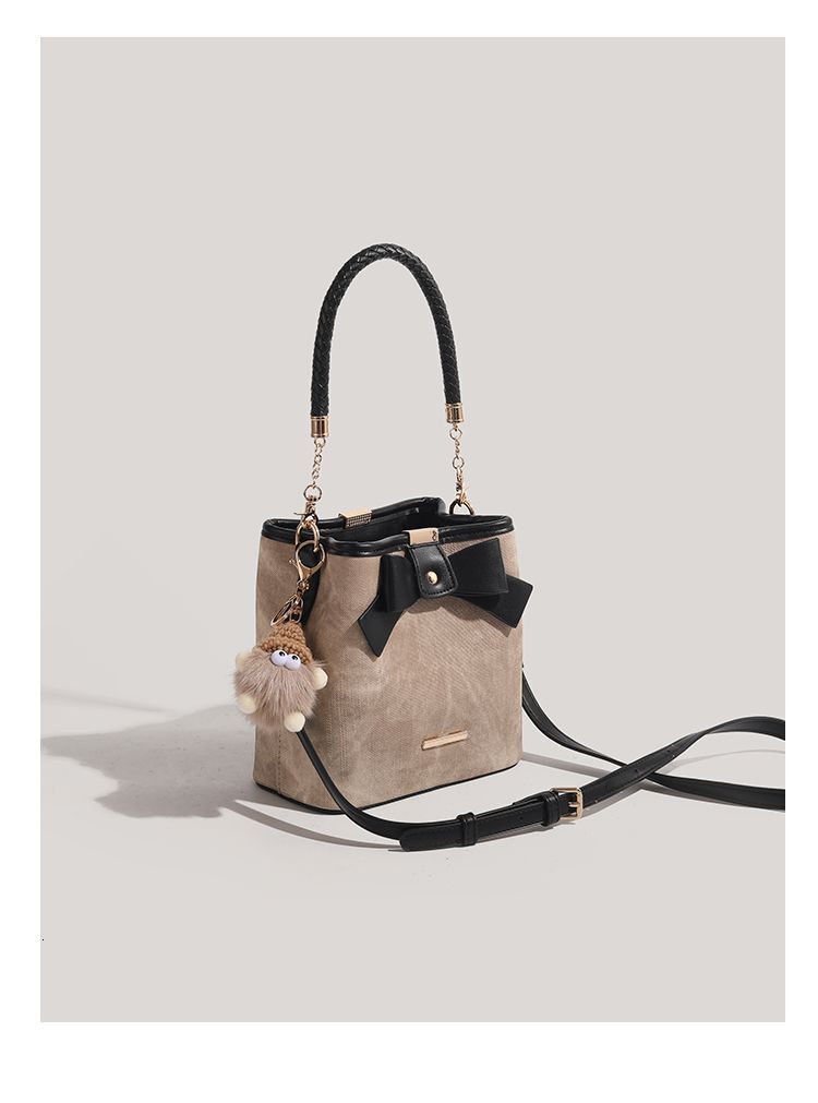 Niche Bow Retro Art Style Women's Shoulder design Bag Bucket Bag Autumn New Simple Style Designer Bag Versatile Women's Crossbody Bag