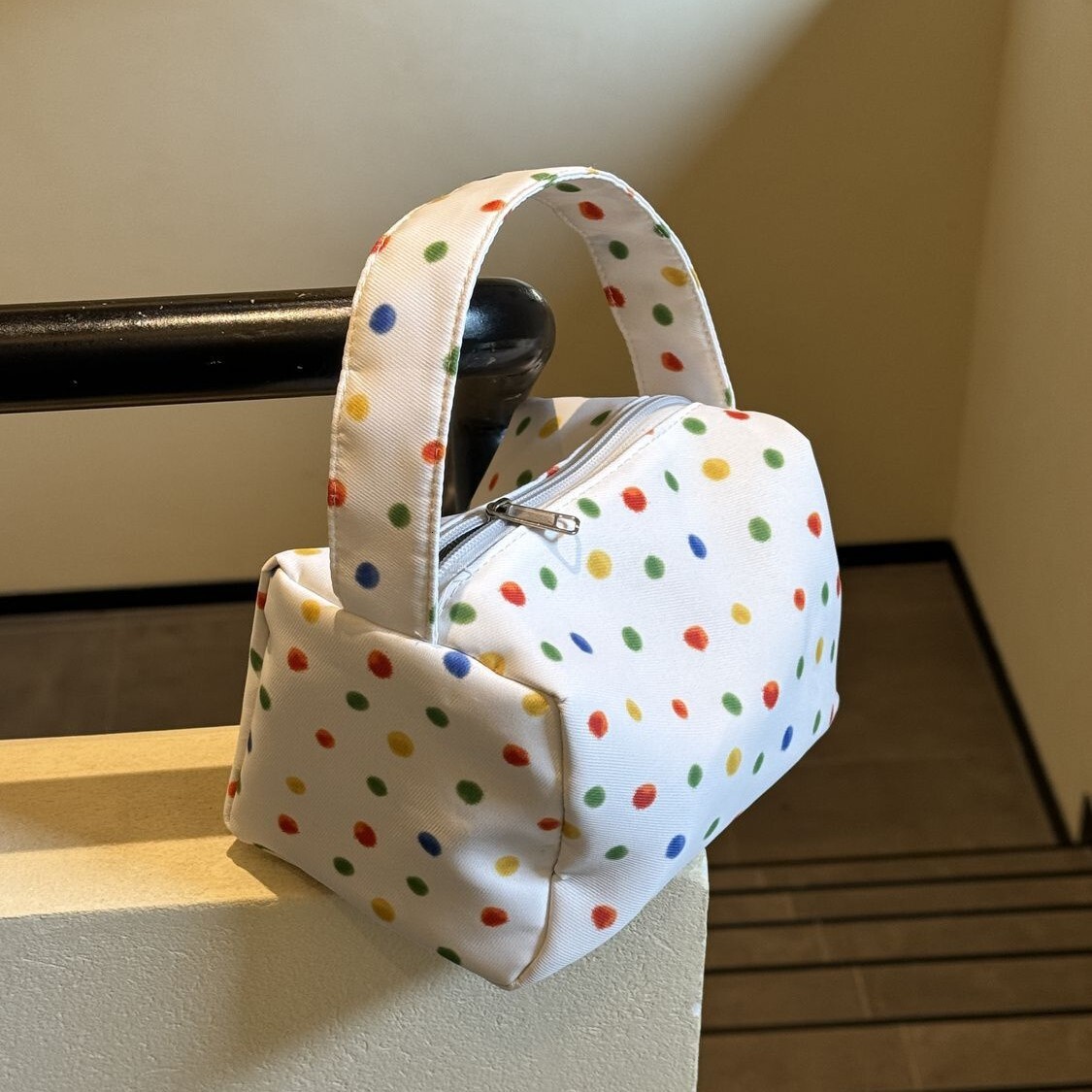 2025 autumn new polka dot compact simple bag elegant niche design makeup bag light luxury large capacity storage lightweight designer handbag