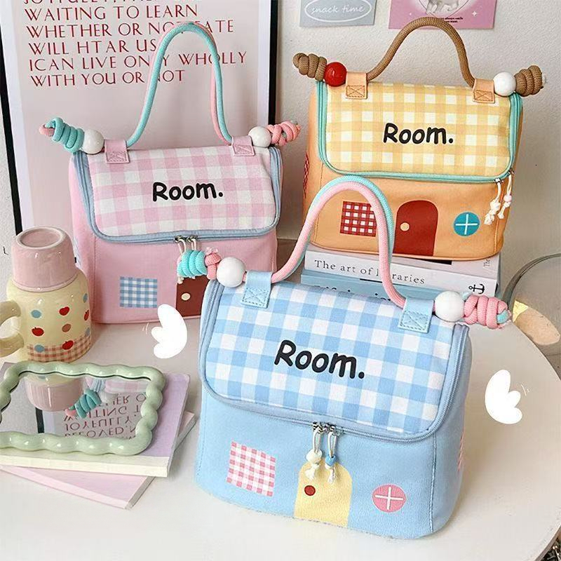 2025 Autumn New Small House Makeup Bag Simple Small Cute Outdoor Makeup Bag elegant Lightweight Large Capacity bag Makeup Bag Designer Handbag