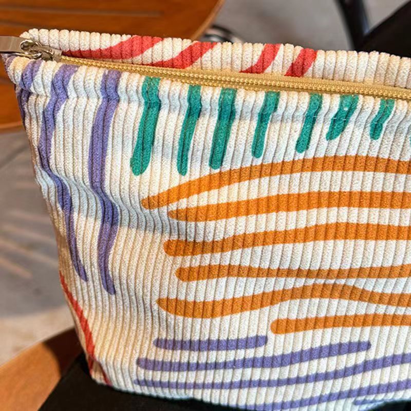 2025 autumn new corduroy color block striped simple makeup bag elegant niche design lightweight travel skincare storage bag wash bag bag designer hand