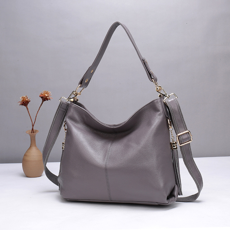 2025 Korean Time Spring Fashion Genuine Women's Handheld Diagonal Cross Bag Leather