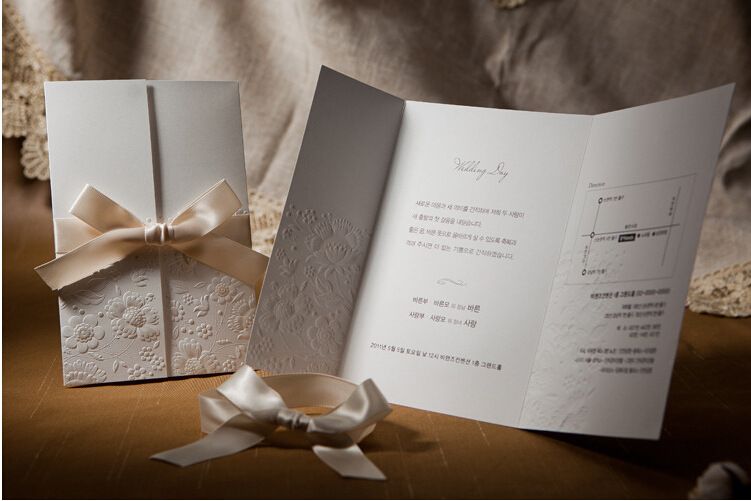 Vintage embossed wedding invitations