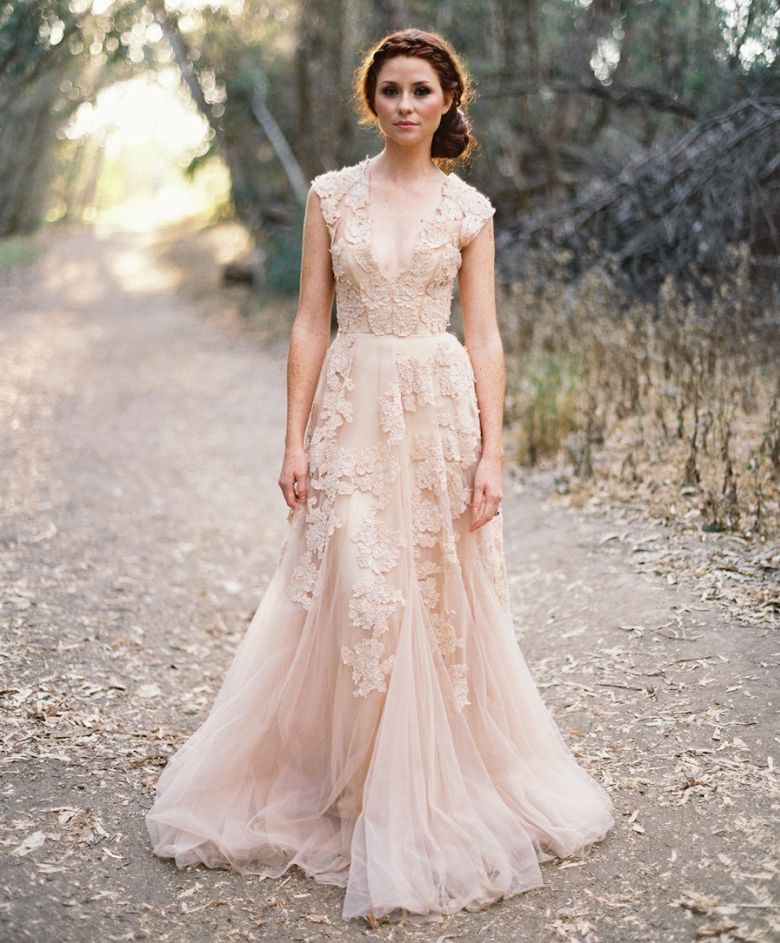 2 women naked wedding dress