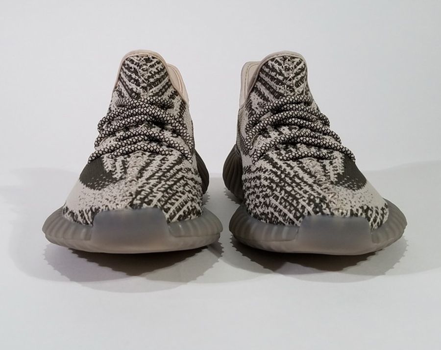 ﻿Core Black Yeezy Boost 350 V2 (BY1604) Fake vs Real Legit Check 