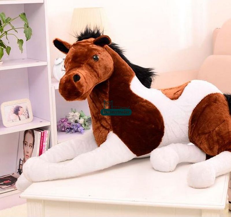 large plush horse with saddle