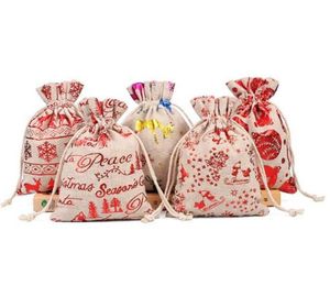 10 * 14cmChristmas bolsos de lazo del patrón de algodón de lino bolsa de tela pequeña manera de los monederos regalos de sacos de yute niños caramelo bolsa de almacenamiento de Protable Monederos