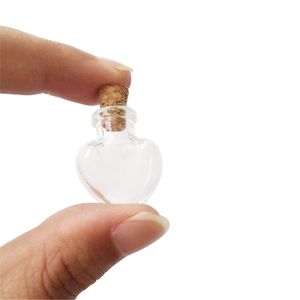 10 piezas 20x24x6 mm transparente claro de botellas vacías de cristal pequeño con el arte Shaped Corchos DIY mini colgantes del corazón regalos Viales