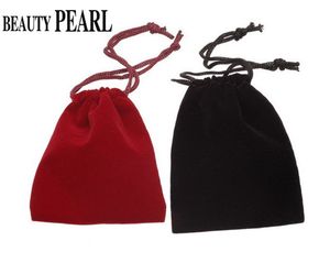 Bolsa de regalo de pana roja o negra para joyería, bolsa con cordón de tela de terciopelo, diferentes tamaños, venta al por mayor, 100 piezas