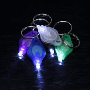 100 pièces porte-clés anneau lumière blanc rouge vert UV LED Mini torche lumière Micro LED porte-clés lampe de poche Mini lampe