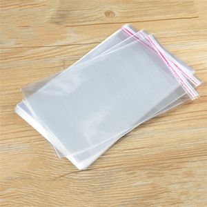 100 unids / lote Bolsas de Celofán Bolsas de Sellado Autoadhesivas Transparentes Bolsas de Regalo de Plástico OPP Planas para Dulces Galletas Ropa Joyería