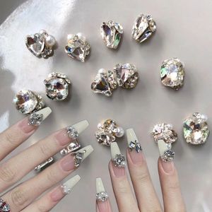 100pcs Diamants de luxe Dercers de piles Nail Charmes en métal strass paillettes bijoux 3D Crystal incrusté perle ongles japonais décorau 240426