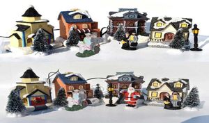 10 piezas Set Navidad Santa Claus Casa de nieve Conjuntos de escenas pequeñas Luminoso LED Iluminar Árbol de Navidad Tienda Decoraciones de pueblo Figuras H1029875392