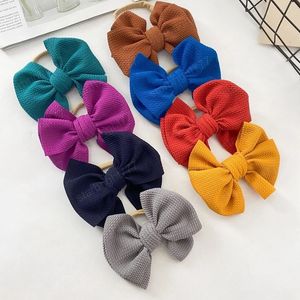 14*11 CM enfant en bas âge couleur unie grand nœud élastique bandeau mignon à la main arcs Nylon bandeau bébé cheveux accessoires Photo accessoires