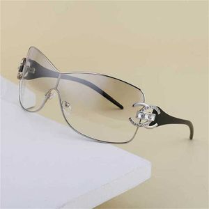 16% de réduction sur la vente en gros de lunettes de soleil nouveau diamant monté coupe-vent mode Y2K grand cadre une pièce lunettes de soleil pour femmes