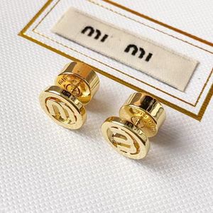 18k oro M letras de la marca aretes de diseñador aretes para mujer retro vintage círculo redondo de lujo desgaste de doble cara aretes chinos aretes anillos de oreja joyería de compromiso