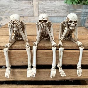 1pc Skull Statues Set Resin Skeleton Shelf-Sitters Assis Figurines pour la librairie à domicile Coule Decorative 240409