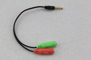 Adaptador de cable de audio 2 a 1 Cabezal de conversión de línea en dos auriculares para teléfono móvil Computadora Reproductor de mp3 Caja de juego Micrófono Gire 300 unids / lote