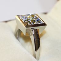 Bezel set engagement rings uk