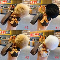Fashion Cartoon Keychain Cute Mouse Designer Key Chain with Pompon Brown Flower PU Leather Keyring Lovers Car Pendant Handbag Bags Accessories Gifts