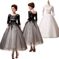 Tea length black cocktail dress
