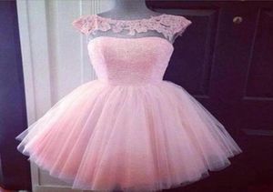 2016 Lindos vestidos de fiesta formales cortos Pink High Neck See a través de vestidos de fiesta de graduación de niñas junior baratas.