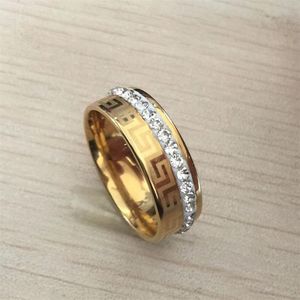 2017 nouveau luxe haute qualité large 8mm 316 titane acier jaune plaqué or clé grecque alliance cristal anneau hommes femmes 244e