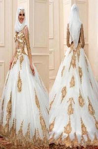2018 robes de mariée musulmanes en Turquie col en v illusion haut 3 4 manches bouffantes chapelle train perlé dentelle dorée robe en tulle ivoire brid5484406