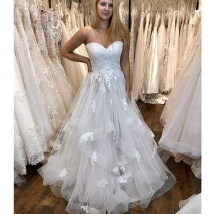 2019 Nuevos vestidos de novia de verano de playa simples y baratos Apliques de encaje sin tirantes Volantes Tallas grandes Vestidos de novia formales 328 328