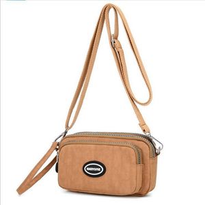 2023 bolsos pequeños de nailon para mujer, bolsos de mensajero de diseñador con letras, bolsos de hombro tipo bandolera con solapa para mujer, bolso tipo billetera 527-15