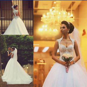 2021 Sweetheart Arabia Saudí Espalda descubierta Vestidos de novia de invierno Cremallera Apliques en la espalda Corpiño con cuentas Vestido de fiesta transparente Organza Nupcial Go209U