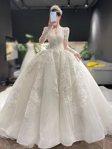 2023 robe de bal arabe robes de mariée de luxe Dubaï cristaux scintillants manches longues robes de mariée tribunal train tulle jupe robes de mariée