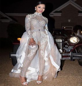 2022 Kardashian Cristales de lujo Monos con cuentas Vestidos de baile Desfile con falda desmontable Cuello alto Cuentas de manga larga Brillante Bl2858744