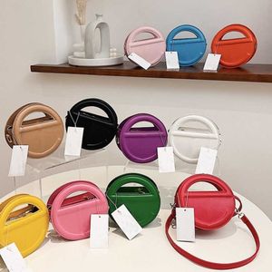 Nouvelle mode mini sacs Portable bandoulière sac de créateur femmes unique épaule sacs de messager petit téléphone rond tendance Porte Carte