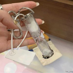 2022 Acrílico transparente Reloj de arena Llavero Accesorios Moda Llavero Llaveros Hebilla para hombres Mujeres Decoración colgante con caja al por menor baiying