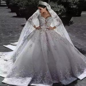 2023 Arabe Charme Une Ligne Robes De Mariée Illusion Pleine Dentelle Appliques Designer Cristal Perles Satin Manches Longues Chapelle Train 263T