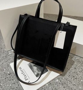 Nouveau sac fourre-tout sac de créateur de sacs unisexe sac de quotidien pour tout le monde boutique originale sac de luxe bouton zipper sac à main