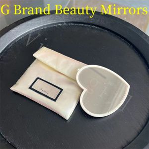 2023 Nouveau G Marque Compact Miroirs Beauté Outils Pour Fille Dame Simple Côté Coeur Style Convient pour Sortir Avec Des Sacs À Poussière Top Qualité Cosmétiques Outil Rapide Livraison Gratuite Chaude