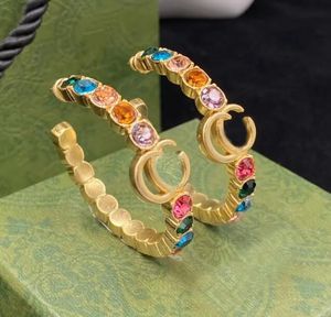 2023 New Hoop Color Diamond Hoop Pendientes Huggie aretes orecchini Personalidad de la moda pendientes de círculo grande fiesta de bodas de las mujeres diseñador de joyas