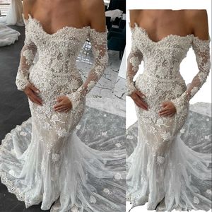 2023 Sexy Mermaid Vestidos de novia de la sirena de la sirena Apliques Pearls Mangas largas Ilusión Sheer Vestidos de Novia Gowns Bridal Africa Ronas Mariee