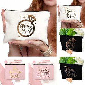 2023 Équipe mariée Imprimer trois couleurs Canvas Cases de cosmétiques Mini Pouche de voyage Holsters de sacs de toilette pour femmes crayon portefeuille H0HE #