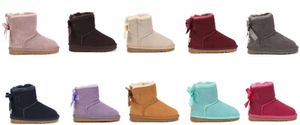 2024 Nuevas botas para niños Australia Botas de nieve Diseñador Zapatos para niños Invierno Clásico Ultra Mini Botton Bebés Niñas Botines de tobillo Kid Fur Suede Zapatos de algodón cálidos