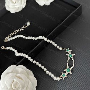 23ss mujer diseñador collar Fashion Star logo Mosaico Diamante zafiro gema blanca collar de perlas Accesorio de joyería de mujer de alta calidad a1