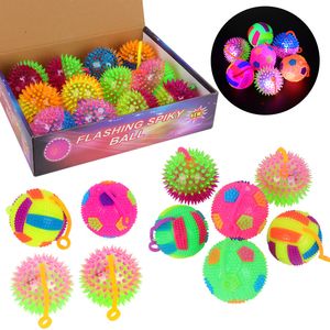 24 Unids / Caja Kids Glowing Ball Toy LED Light Up Intermitente Suave Espinosa Bola de Masaje Elasticidad Juguetes Divertidos Niños Squeeze Anti Stress Toys LT0099