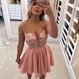 Elegant New V Neck Blush Pink Beads Short Homecoming Dresses Sleeveless Evening Gowns Sheer Lace Pearls Mini Cocktail Party Gowns Z25