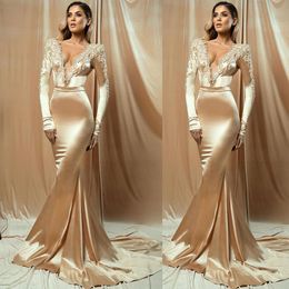 Champagne Evening Designer Dresses Long Sleeves Mermaid Illusion Sexy Lace Applique Beaded Crystals Custom Made Satin Prom Party Gown Sweep Train Vestidos