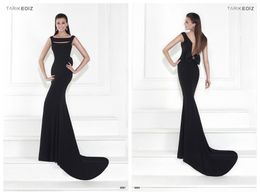 ... Black Jersey Sheer Back Sleeveless Crystal Beaded Bow Prom Dresses