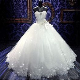 2020 Sexy Bling Cheap A Line Wedding Dresses Sweetheart Sleeveless Lace Appliques Crystal Beaded Pearls Ball Gown Bow Formal Bridal Gowns