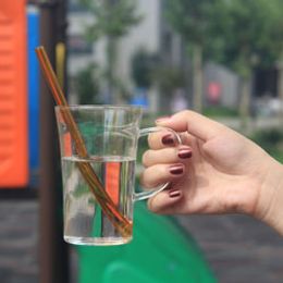 What are the dangers of plastic straws and hot drinks?