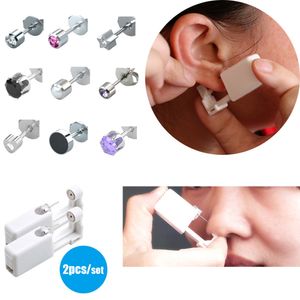 2PCS / SET SET DISPOSable SAFE STÉRILE Le nez d'oreille Piercing Unité cartilage Tragus Helix Piercing Gun Piercer Machine à outils Kit Stud Body Bijouts