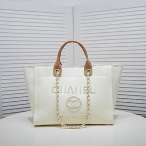 Designer Totes 2023 Nouveaux sacs à main de luxe Sac à bandoulière Dames Sac à main à tricoter Grand sac fourre-tout avec chaîne Toile Sac à provisions de haute qualité Sacs 01